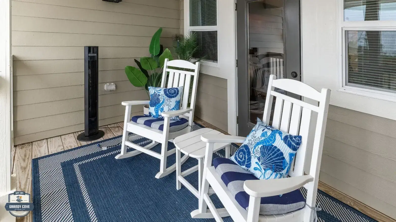 Grandy Cove porch with rocking chairs overlooking Currituck Sound