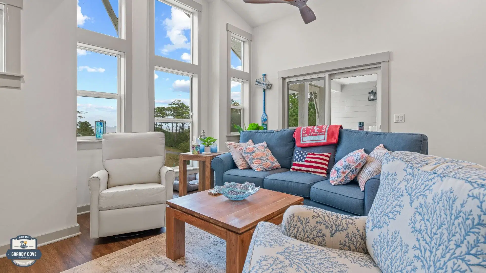 Grandy Cove living room with floor-to-ceiling windows