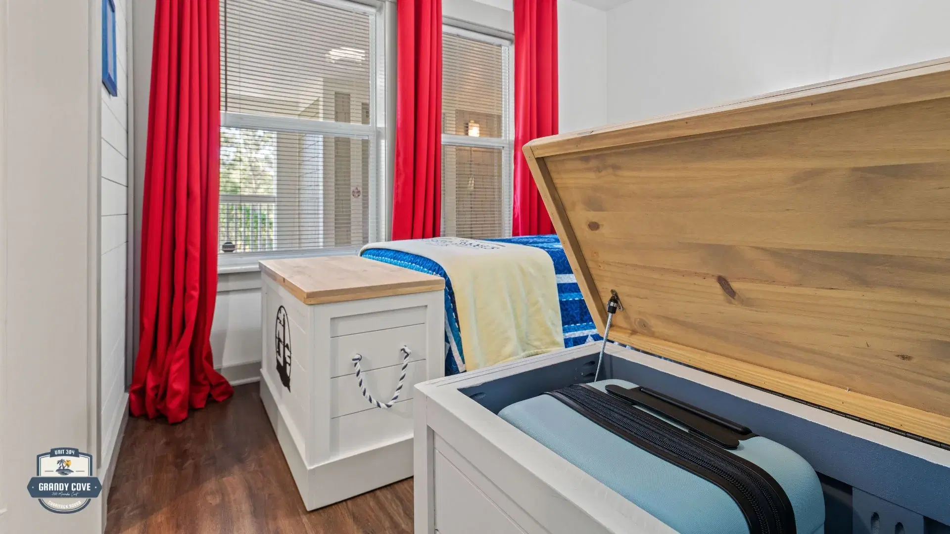 Grandy Cove third bedroom with storage trunk for vacation gear
